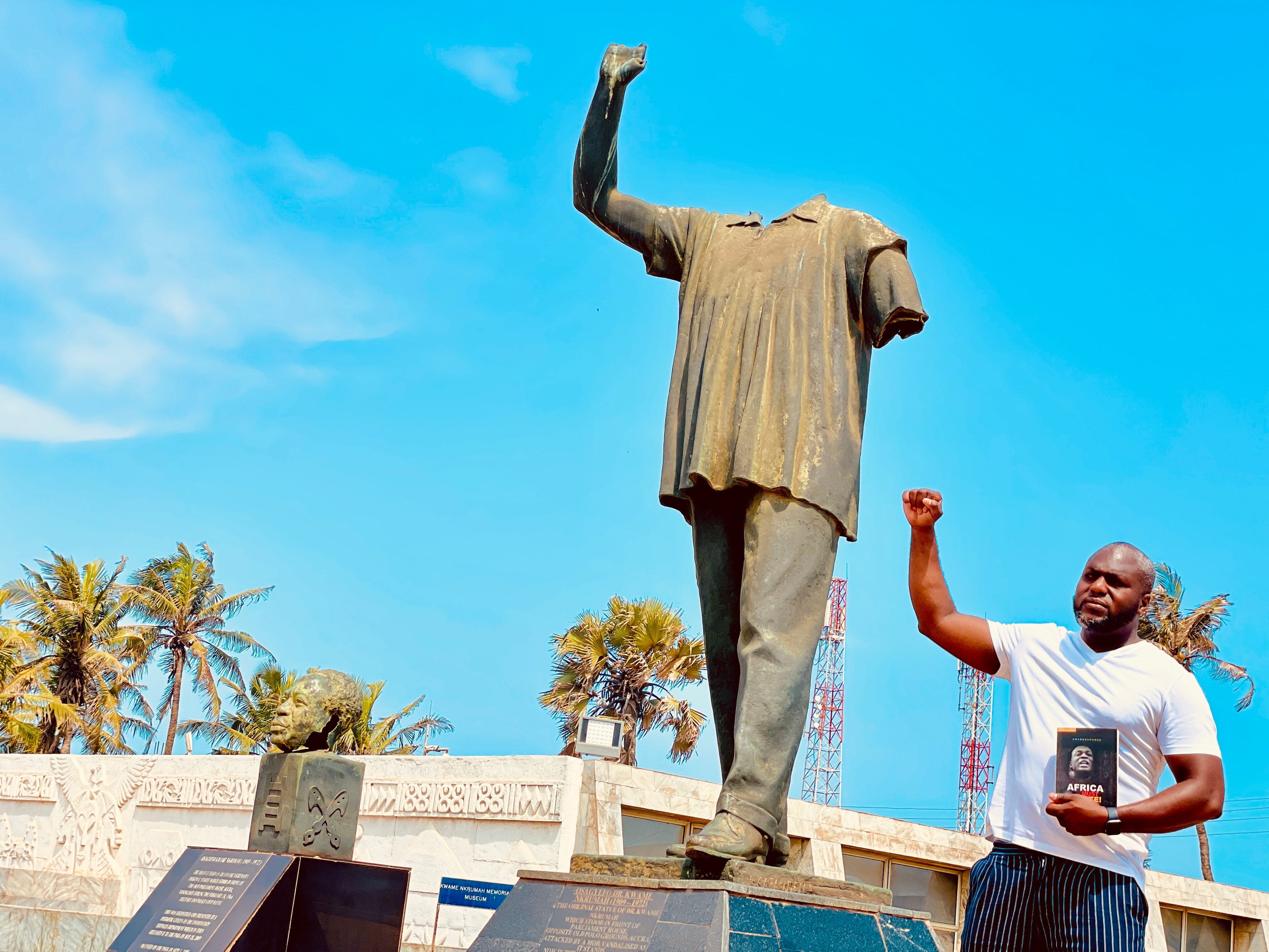 Tony Forte — fist raised at Kwame Nkrumah monument, Ghana